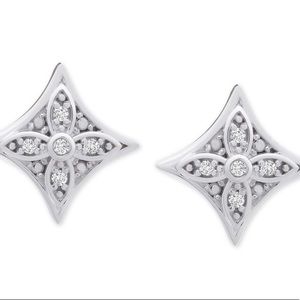 Diamond earrings—1/10 carat.  Sterling silver.